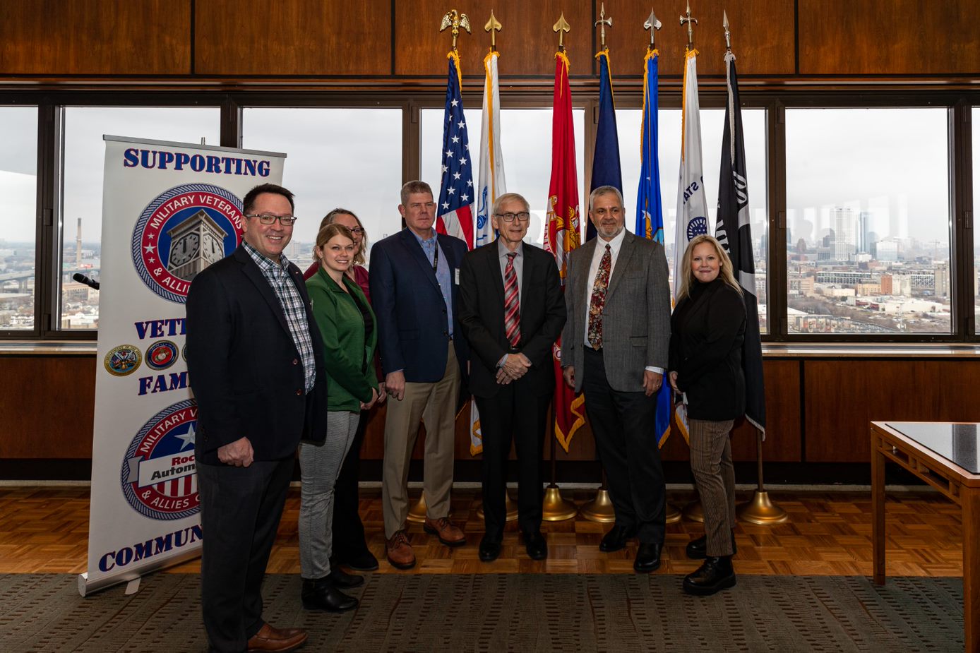 Group photo of We Energies employees, Gov. Evers and DWD staff.